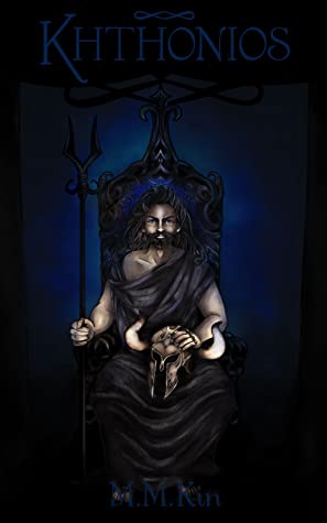 book cover for M.M Kin's Khthonios. Features Hades, holding a horned helmet as he sits on a dark throne against a blue background. 